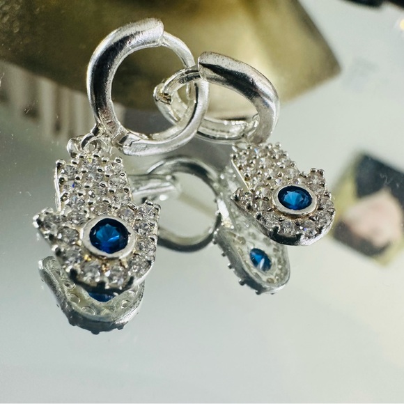 Elegant Silver Hamsa Earrings with Blue Zircon Accents - Picture 3 of 10